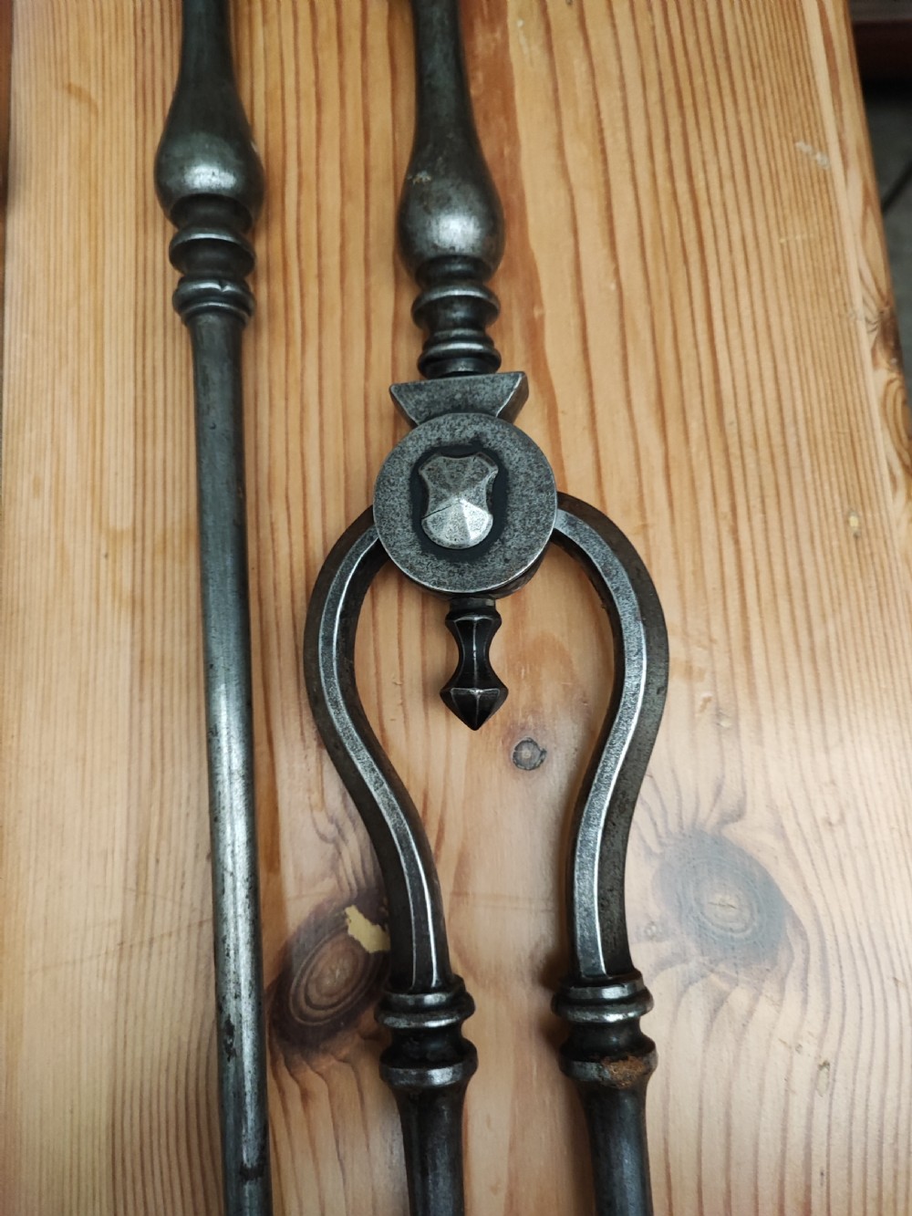 A fine set of Regency steel fire irons View IV