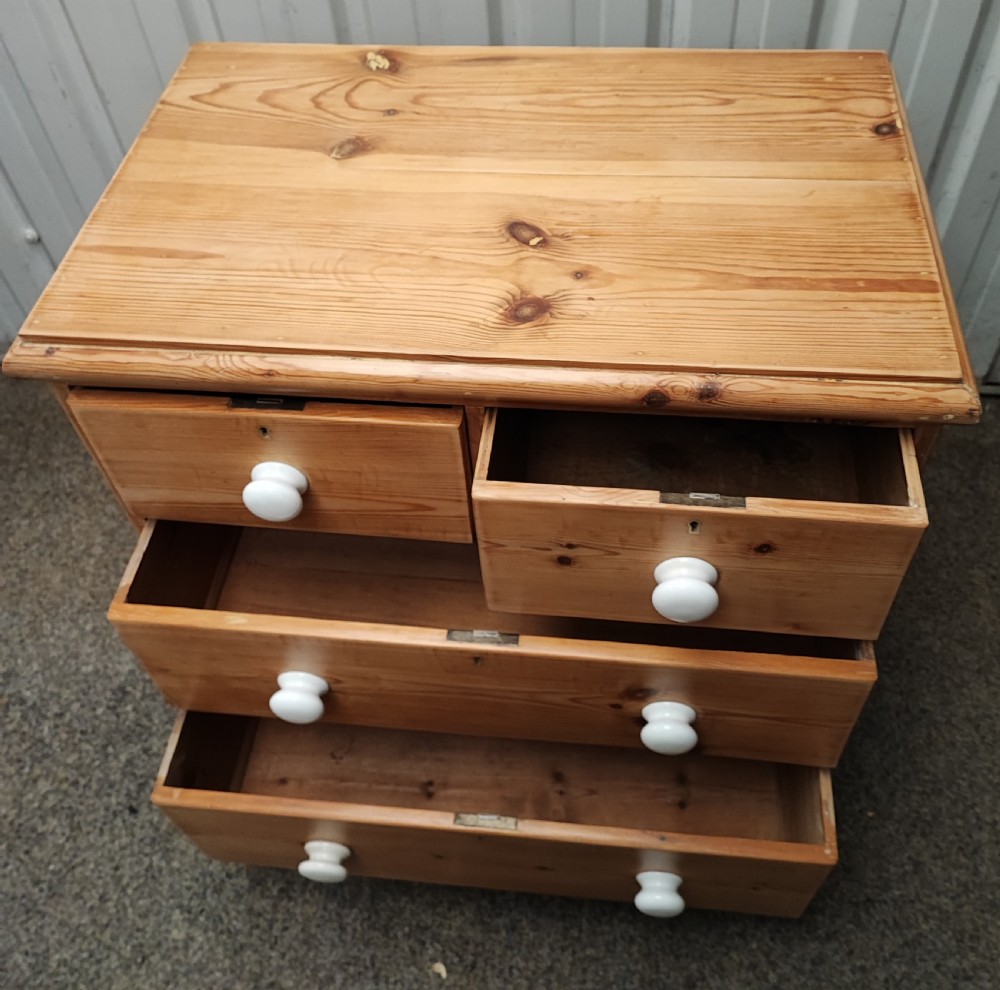 A Victorian pine chest of drawers. View IX