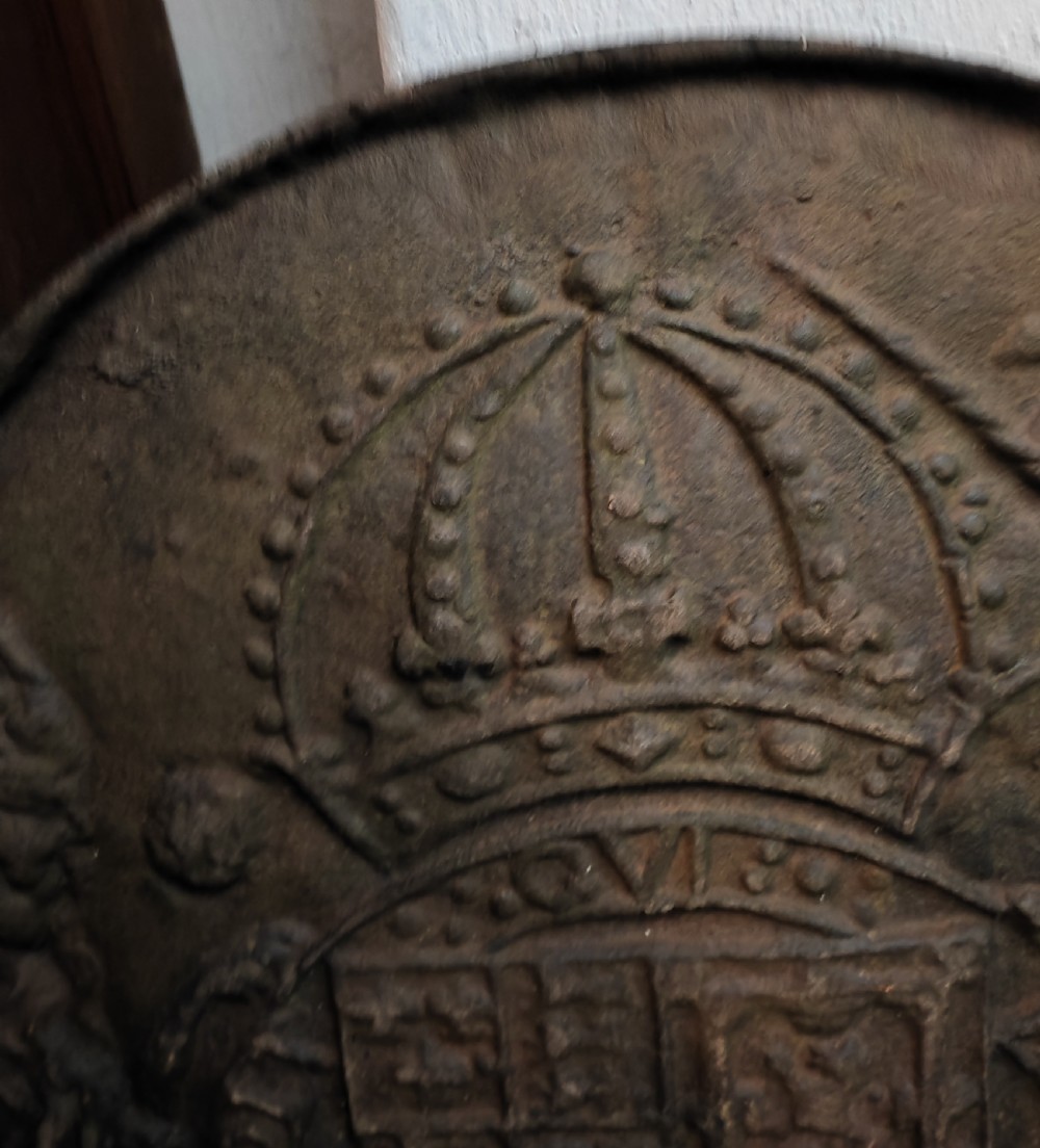 Antique cast iron royal military crested fire back. View IX