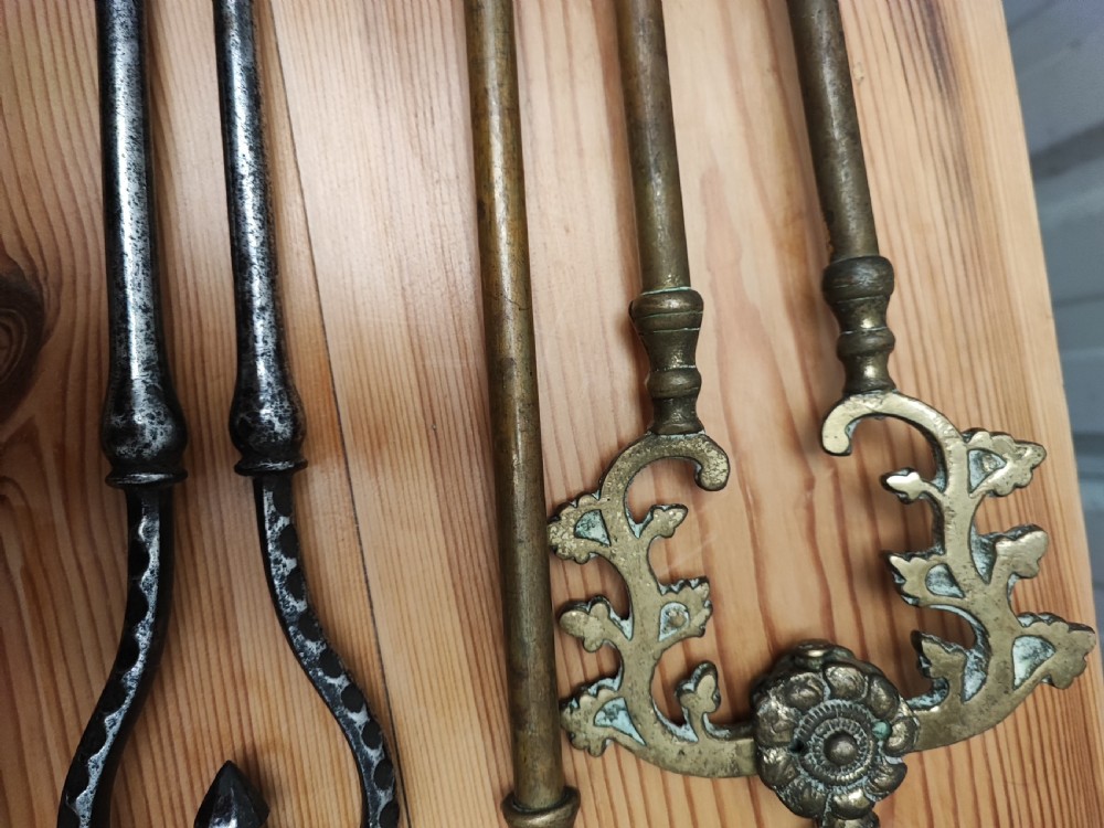 A Regency brass and steel collection of fire irons View III