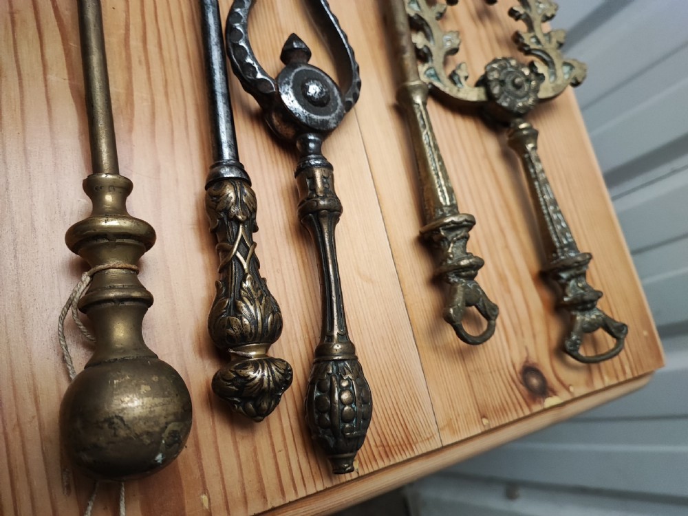 A Regency brass and steel collection of fire irons View VII
