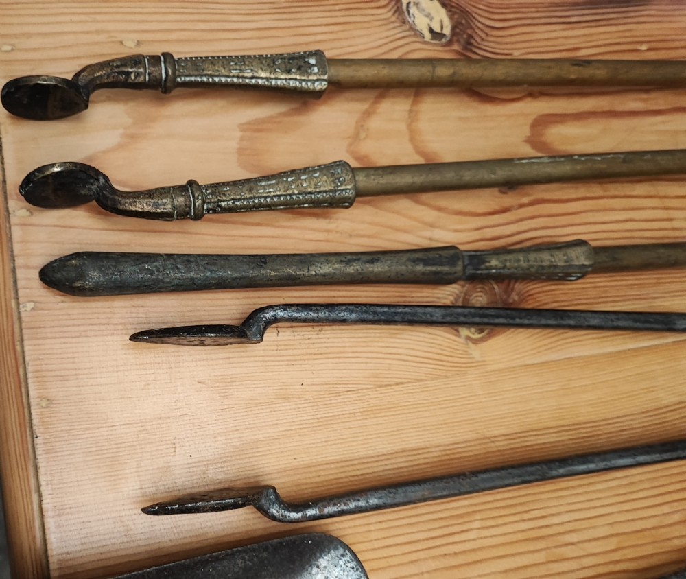 A Regency brass and steel collection of fire irons View XI