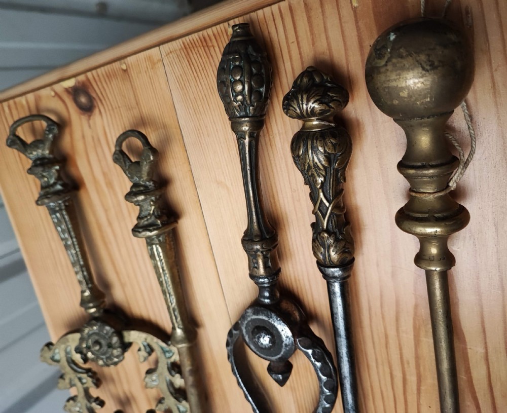A Regency brass and steel collection of fire irons View XV