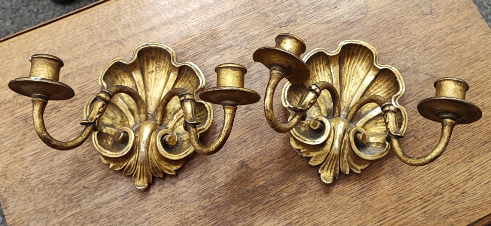 A pair of 19c gilt wood and gesso shell wall lights.