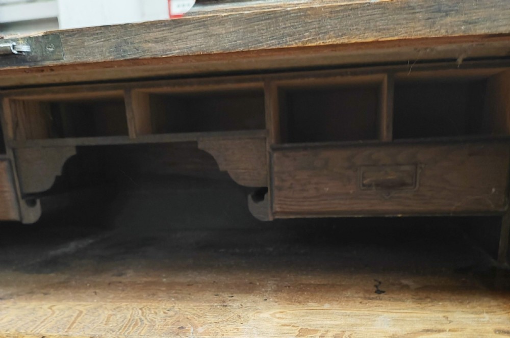 An antique oak roll top desk and chair  View III