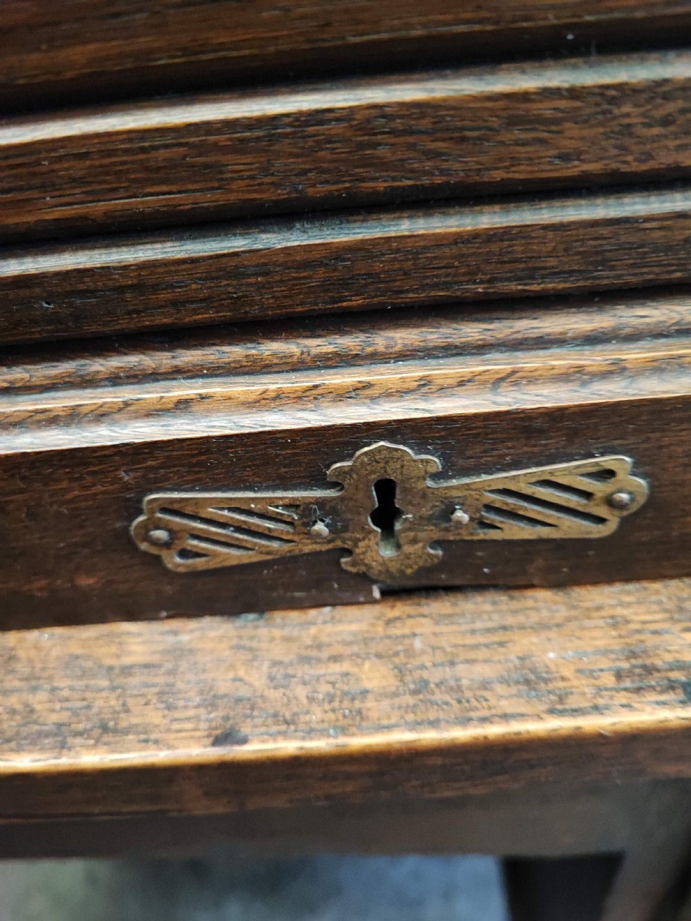An antique oak roll top desk and chair  View X