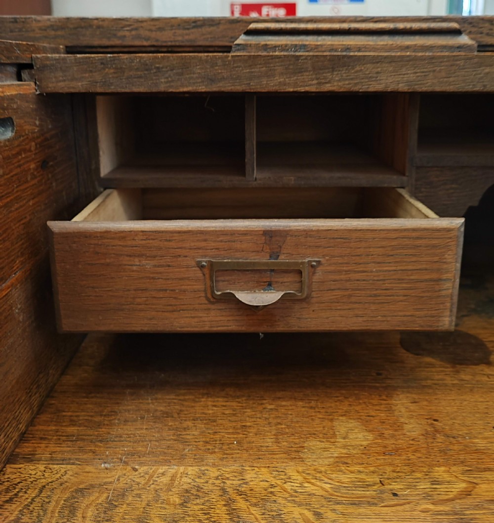 An antique oak roll top desk and chair  View XV