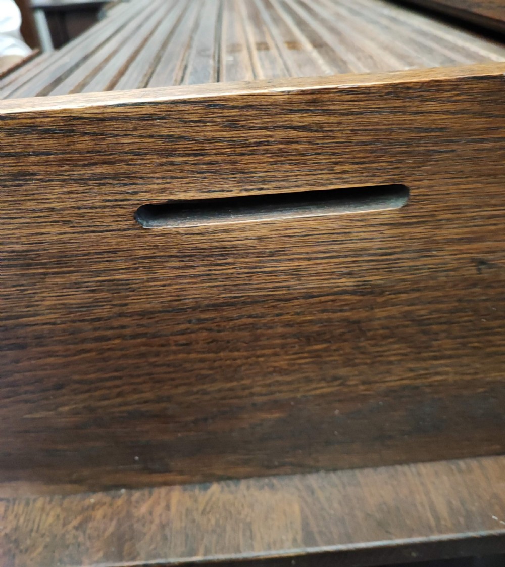An antique oak roll top desk and chair  View XVII