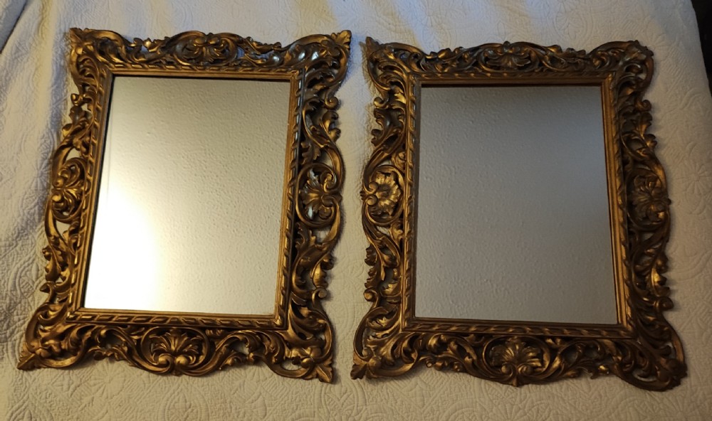 Quality pair of antique giltwood Florentine mirrors.