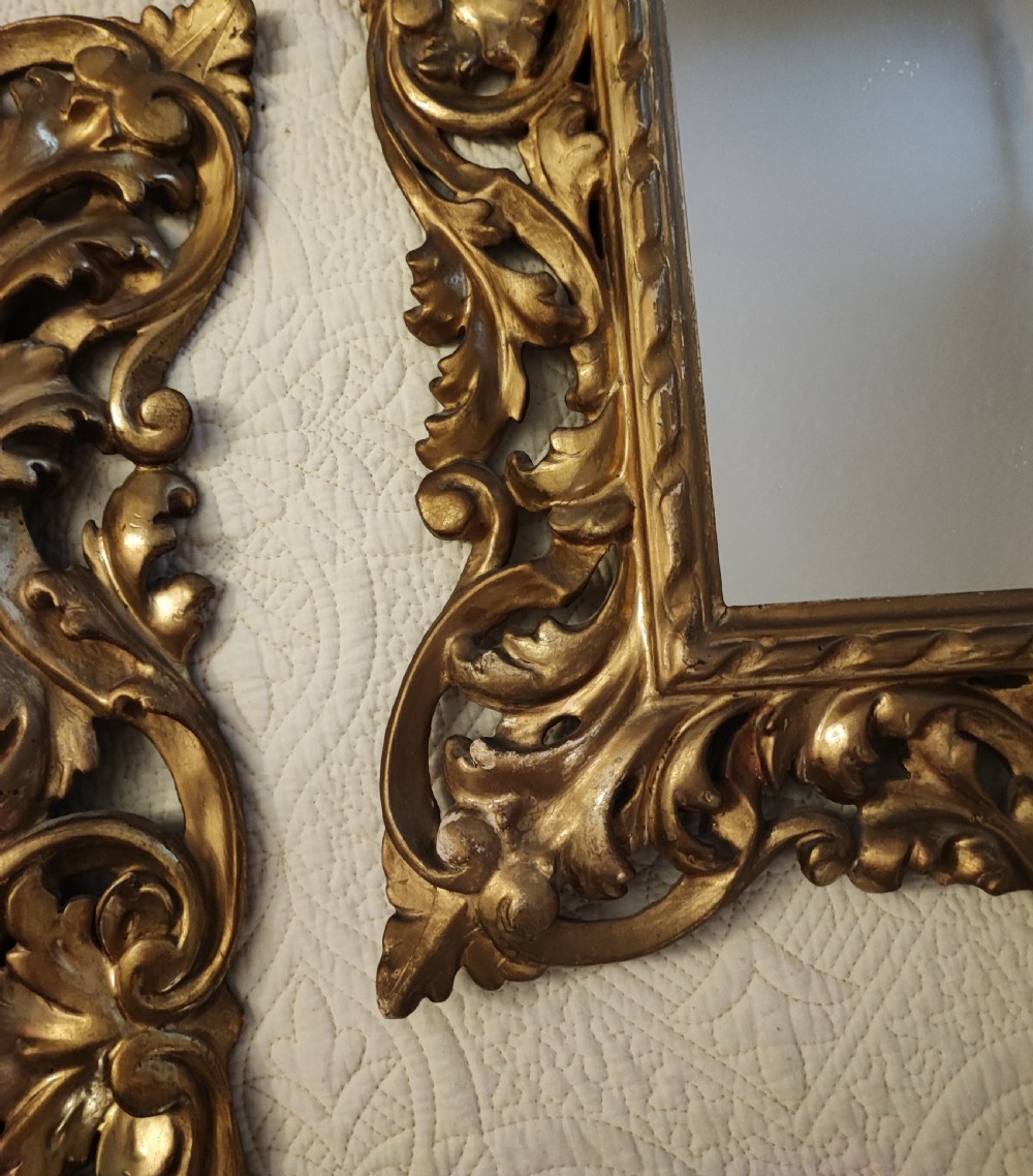 Quality pair of antique giltwood Florentine mirrors. View IX