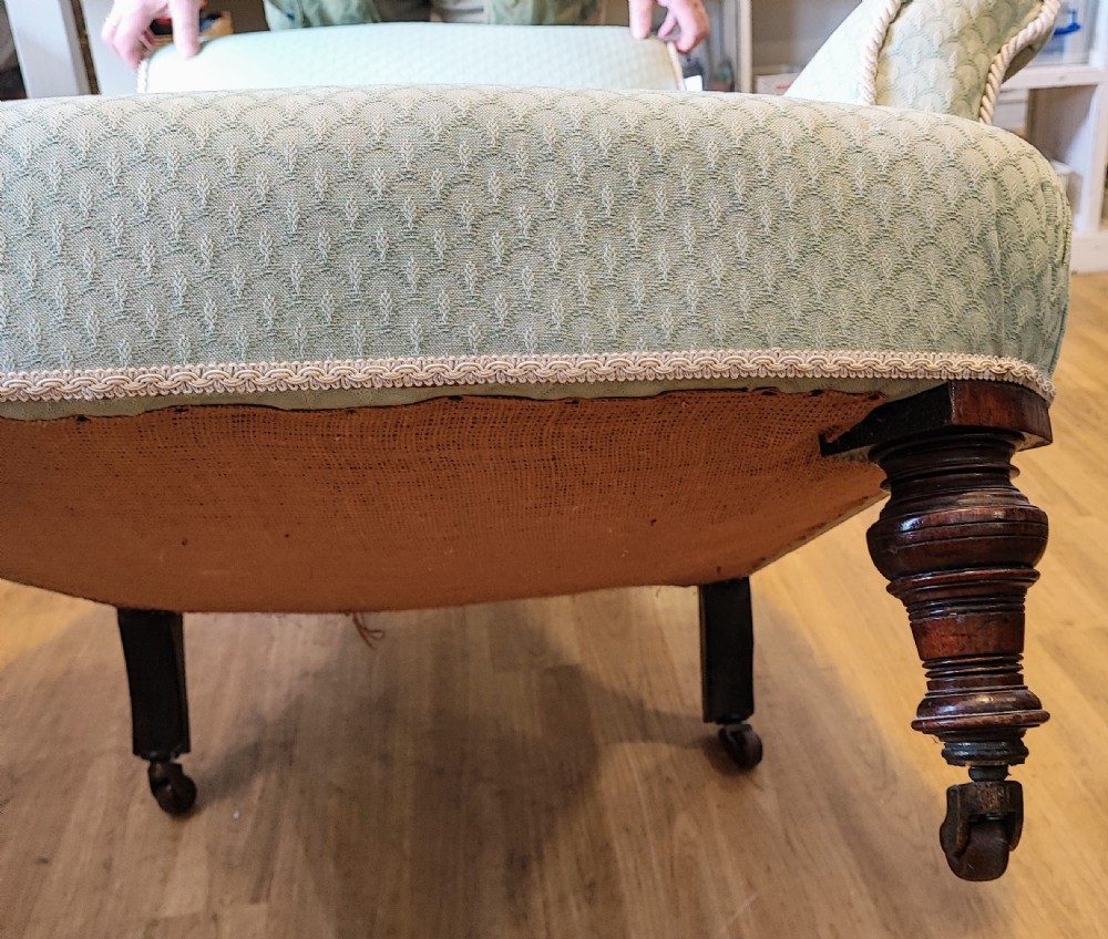 Antique upholstered armchair. View II