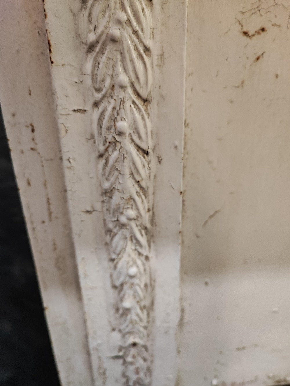 A Victorian cast iron fire surround View III