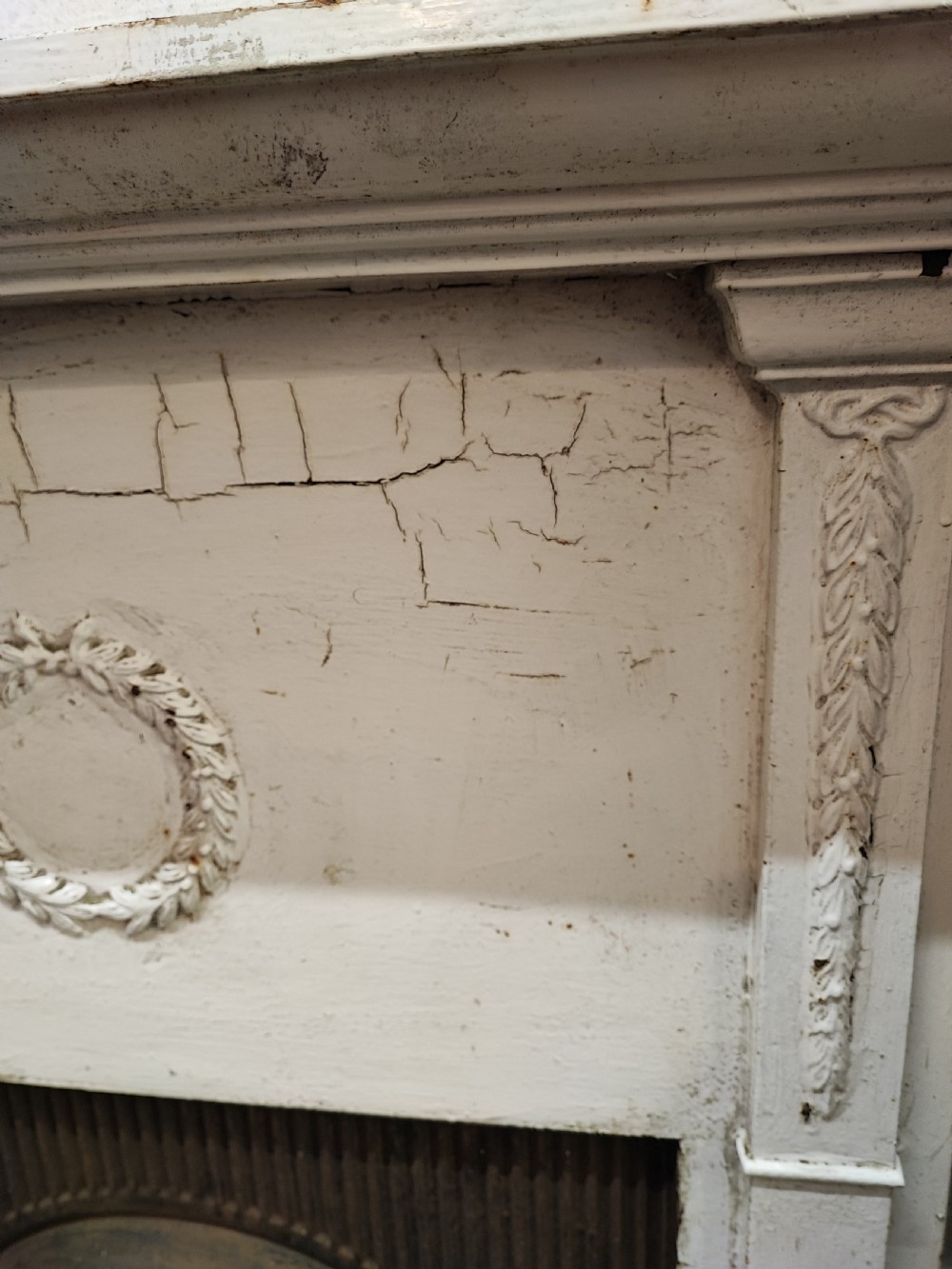 A Victorian cast iron fire surround View VII