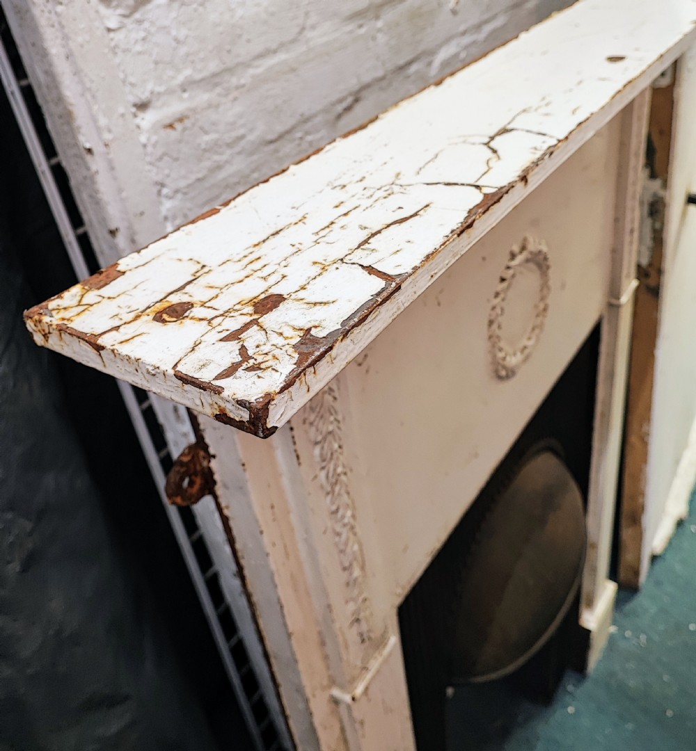 A Victorian cast iron fire surround View VIII