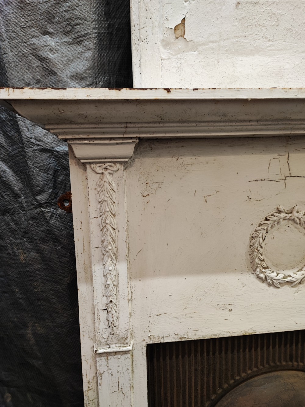 A Victorian cast iron fire surround View IX