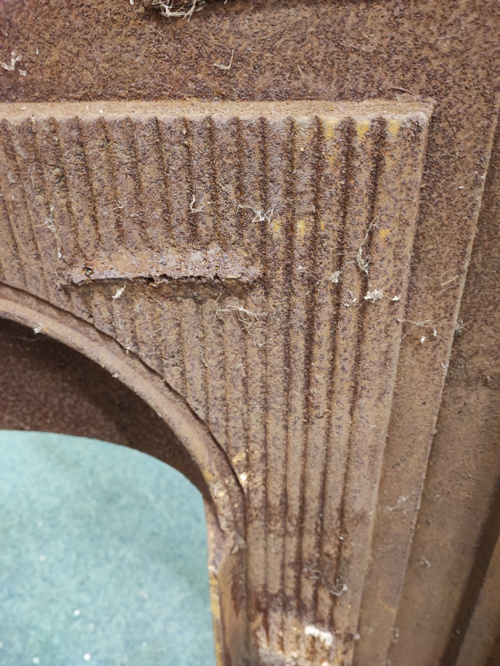 A Victorian cast iron fire surround View XII