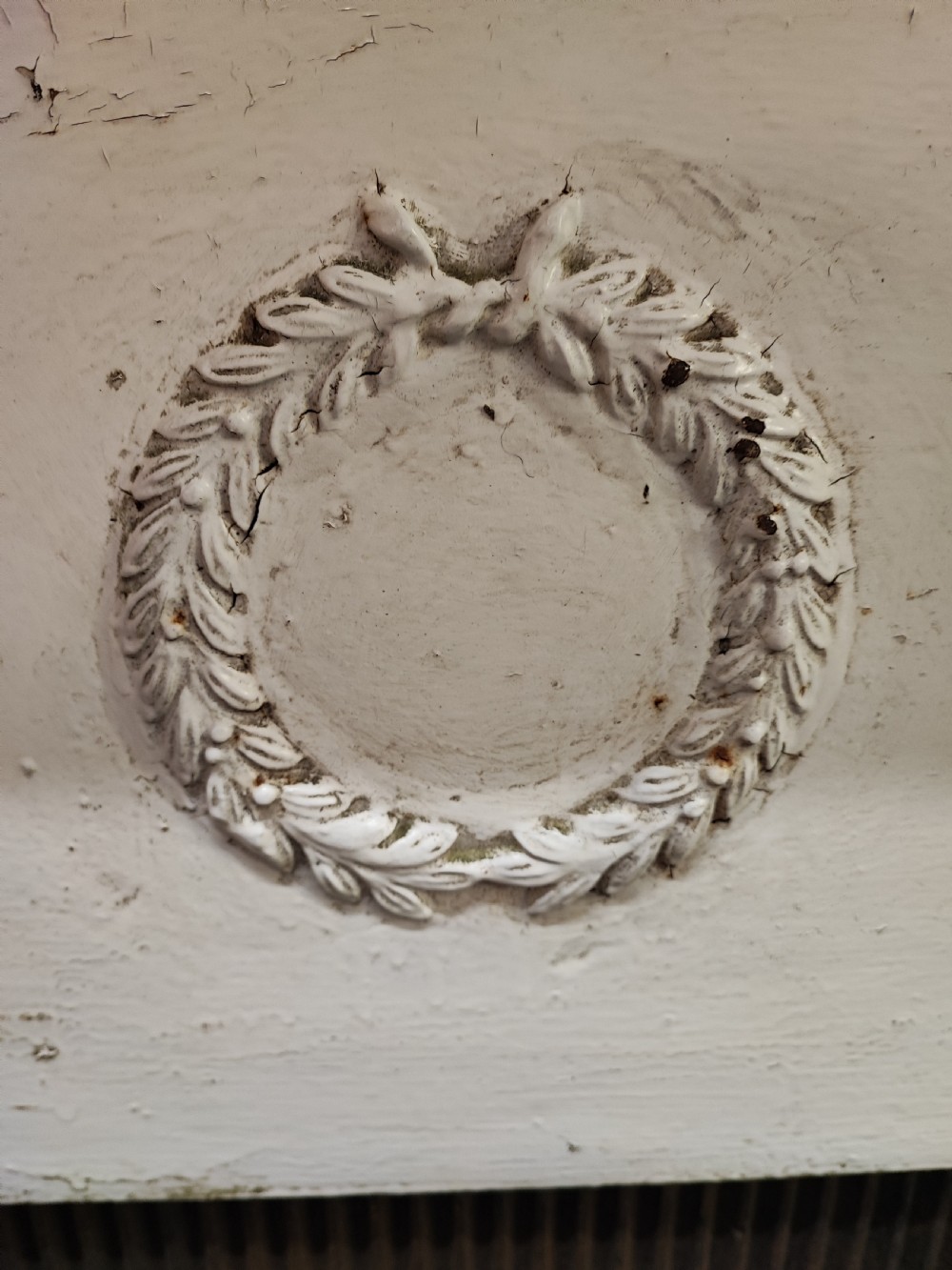 A Victorian cast iron fire surround View XIV