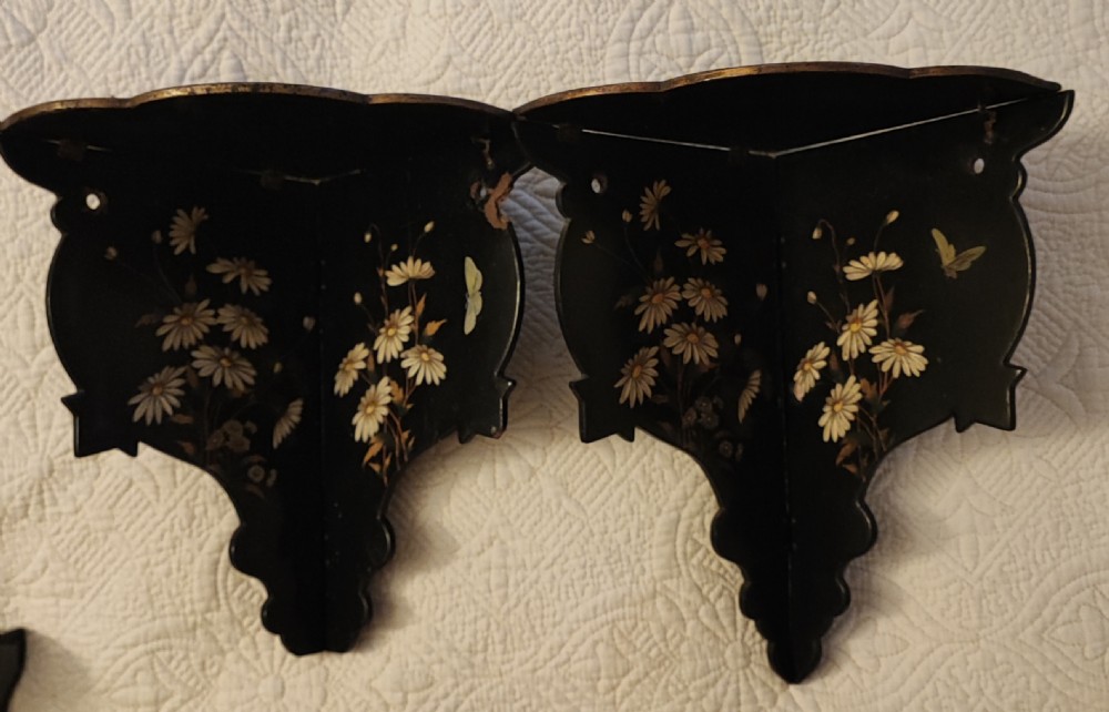 Pair of Antique asthetic movement paper mache wall brackets.