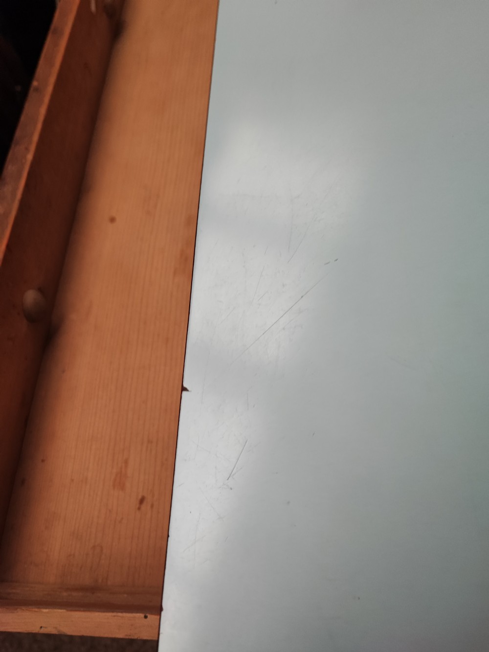 An antique pine kitchen table with duck egg blue Formica top. View VIII
