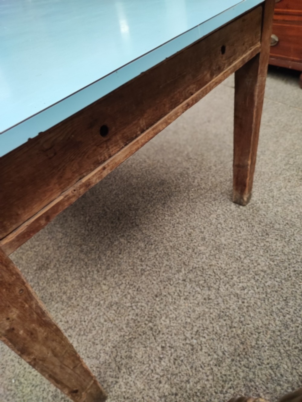 An antique pine kitchen table with duck egg blue Formica top. View XIII