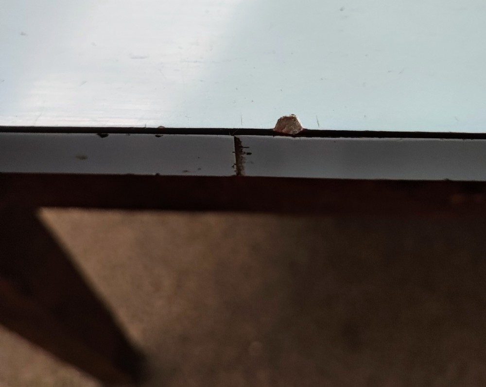 An antique pine kitchen table with duck egg blue Formica top. View XVI