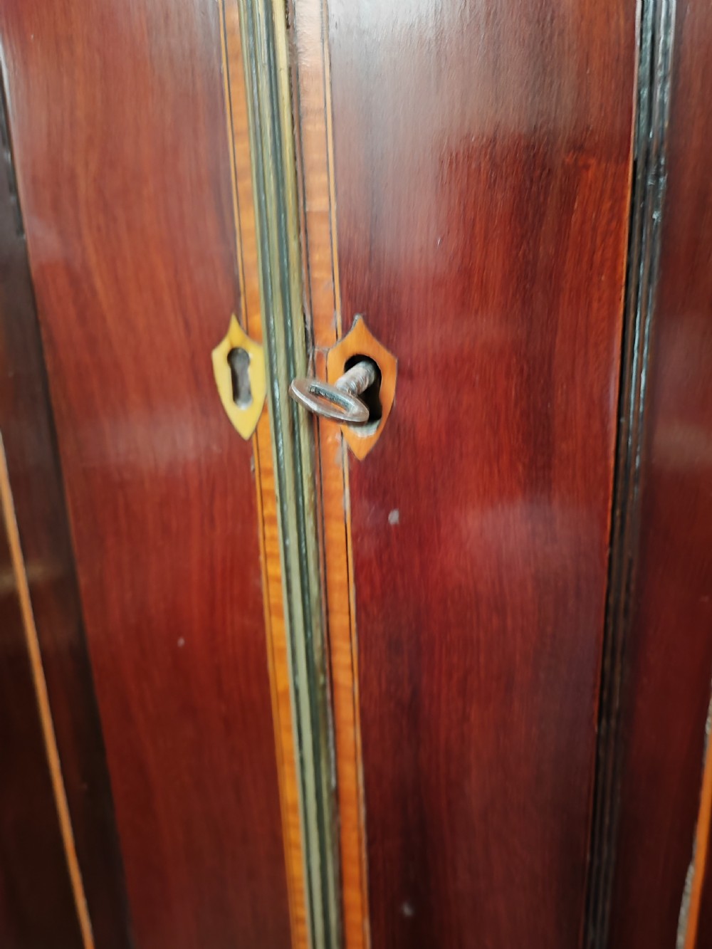 Good Regency inlaid linen press. View VIII