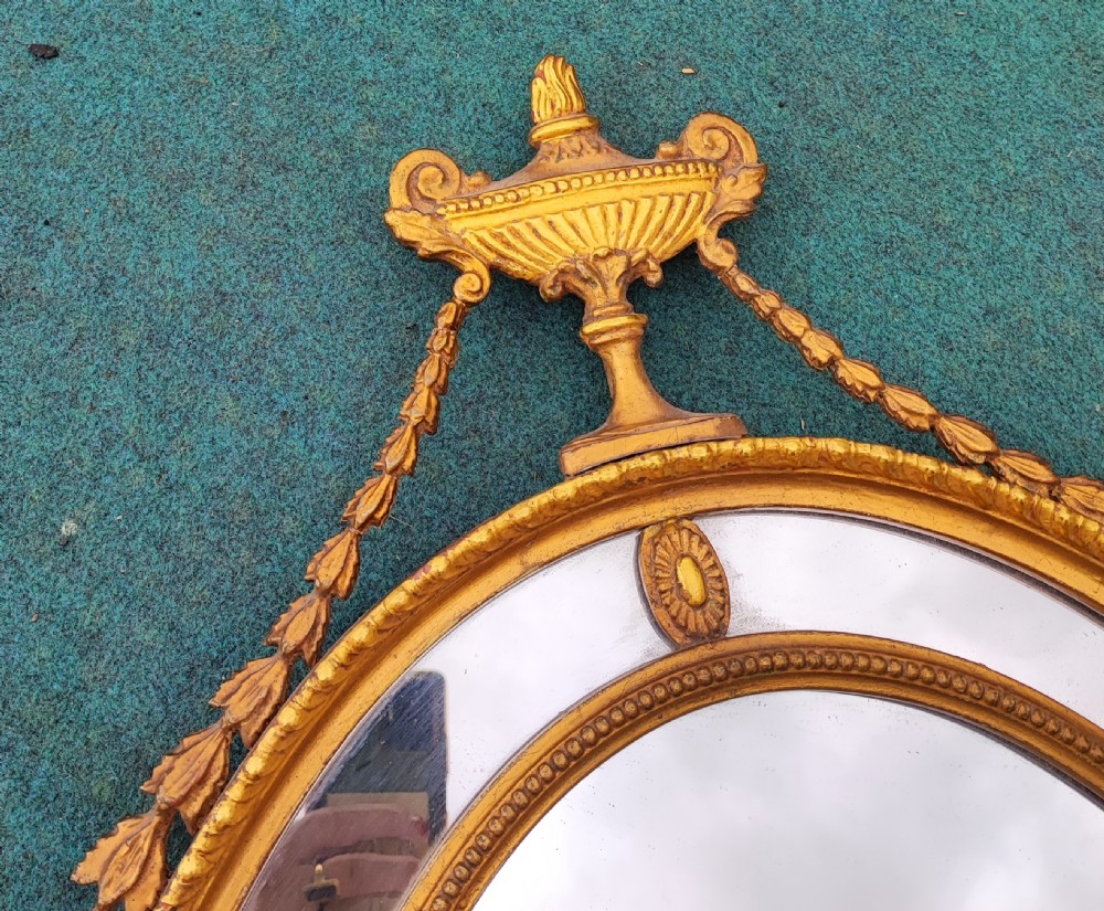 Pretty Edwardian carved giltwood and gesso oval mirror. View VI