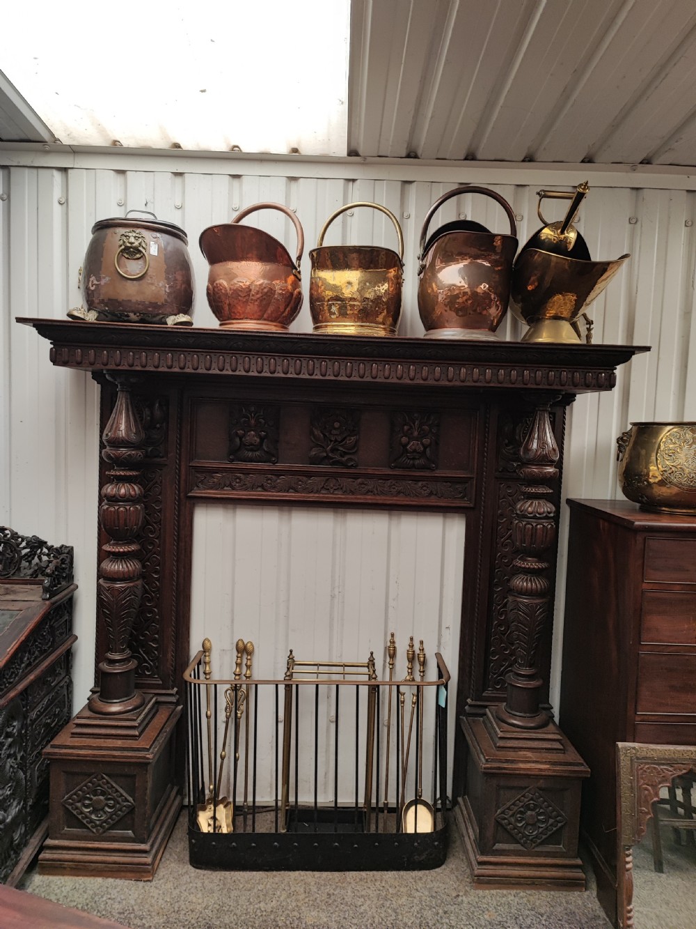 Impressive antique carved oak fire surround. View II