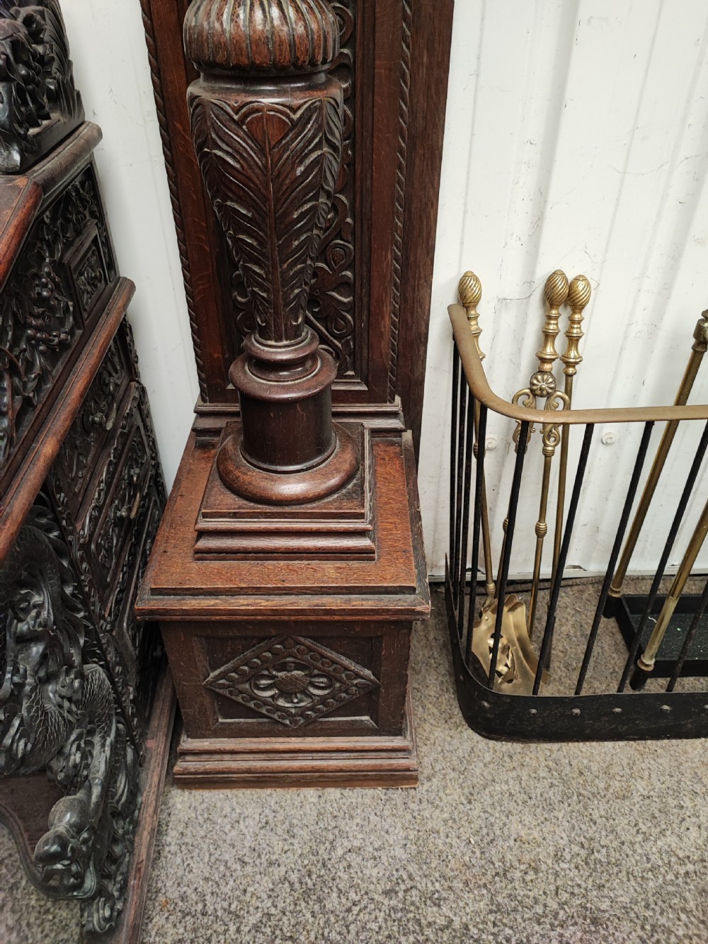 Impressive antique carved oak fire surround. View X