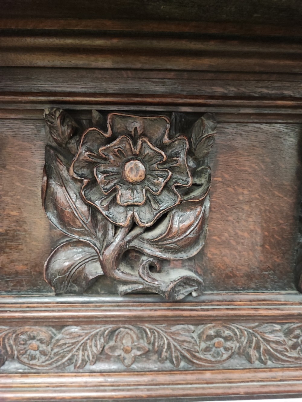 Impressive antique carved oak fire surround. View XII