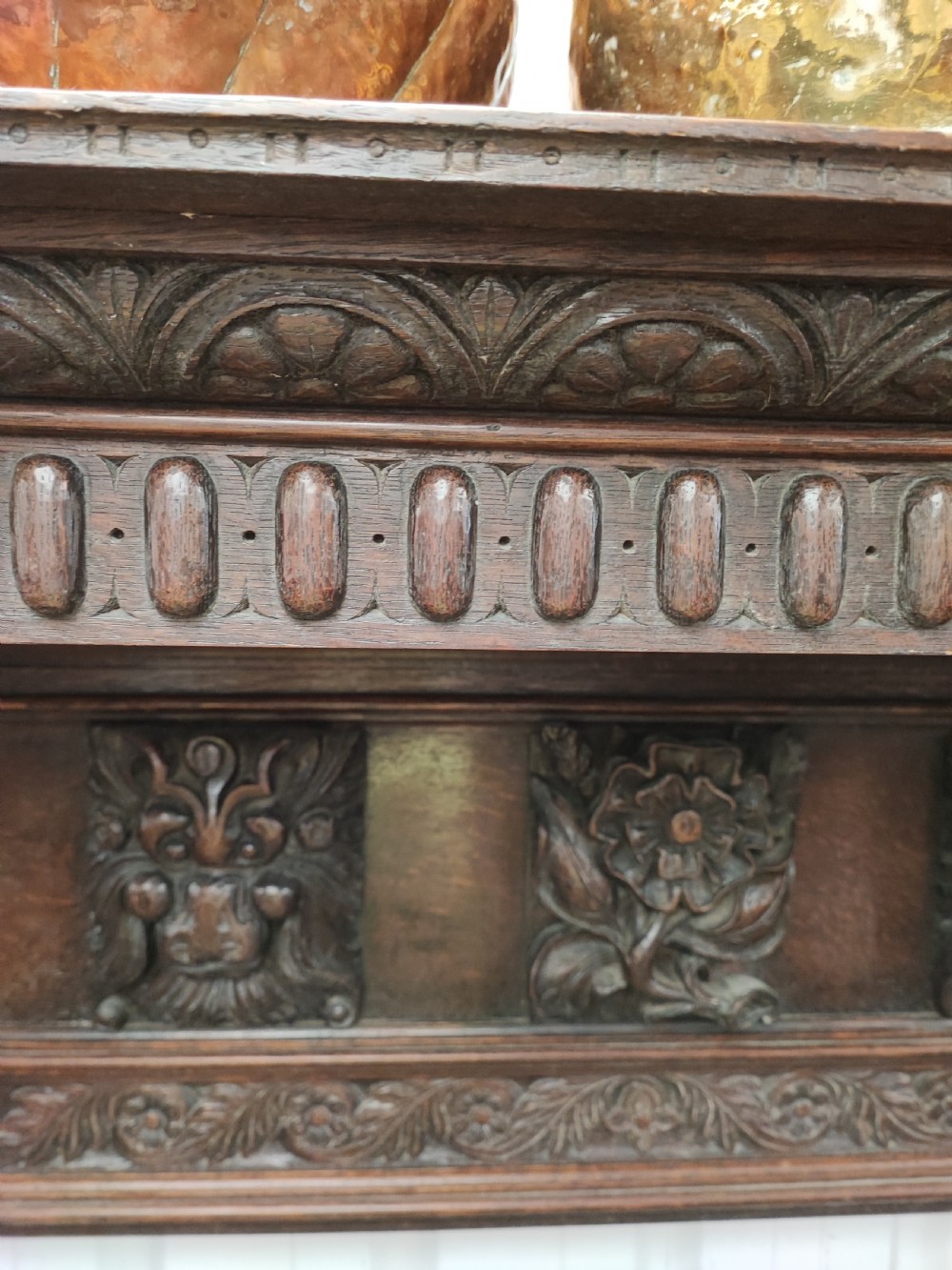 Impressive antique carved oak fire surround. View XIV
