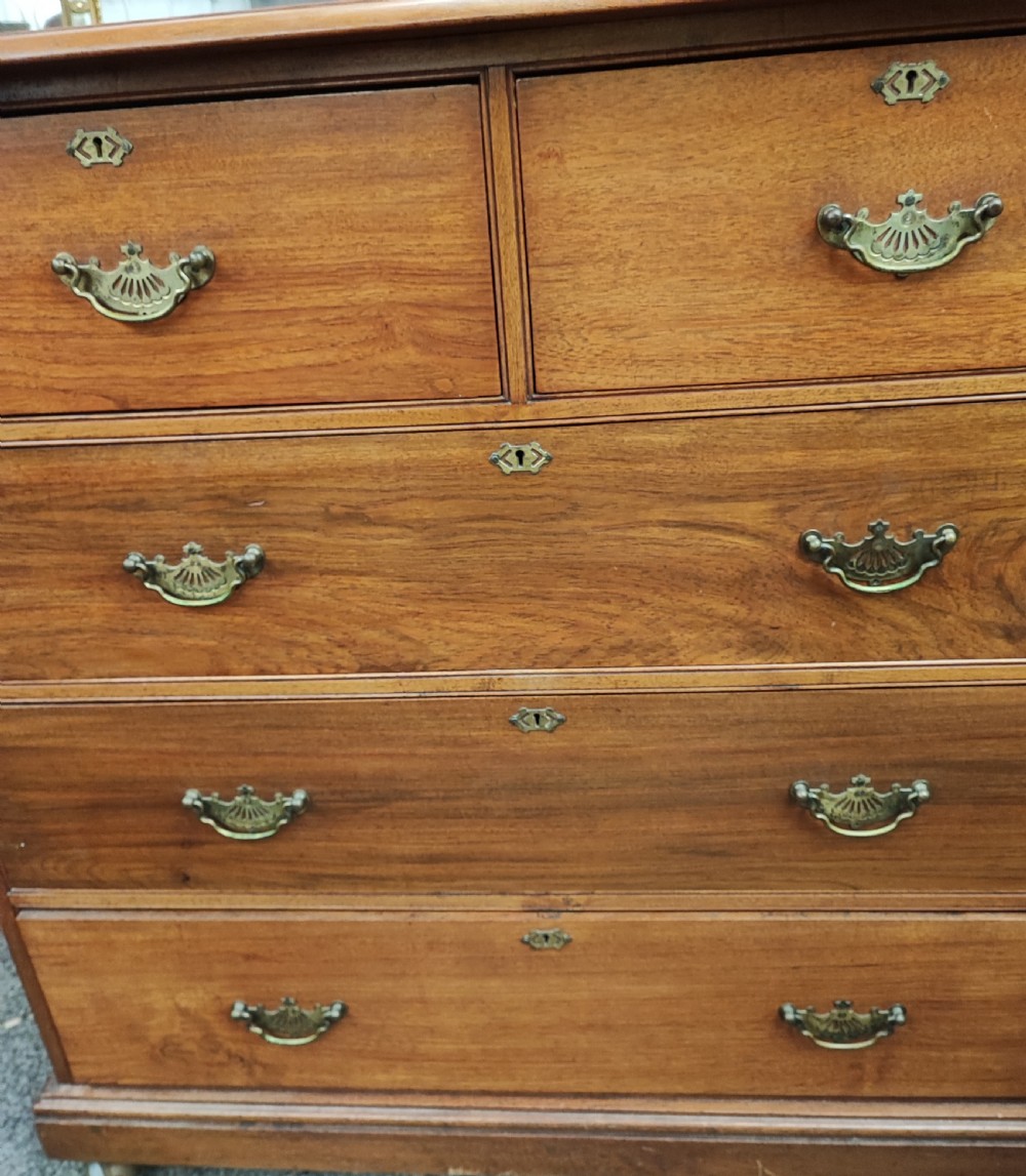 A Victorian solid  walnut chest of drawers. View V