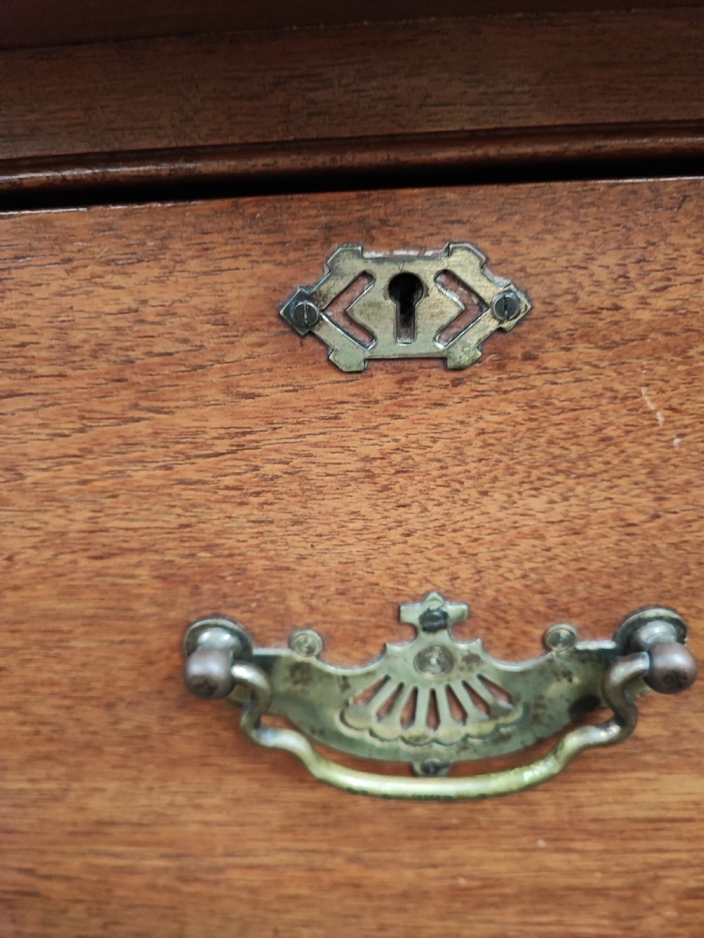 A Victorian solid  walnut chest of drawers. View VII