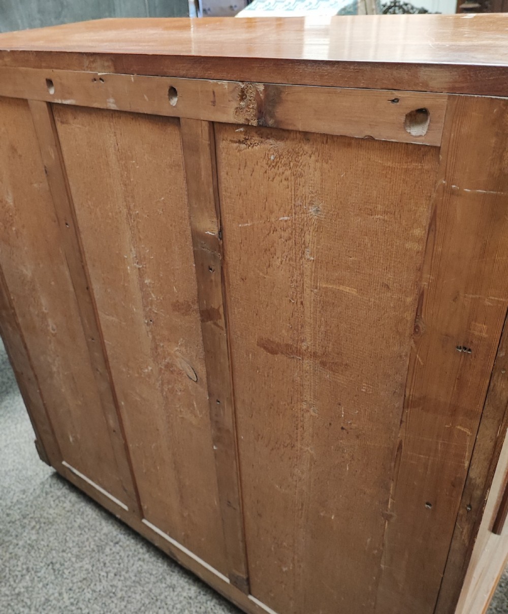 A Victorian solid  walnut chest of drawers. View IX