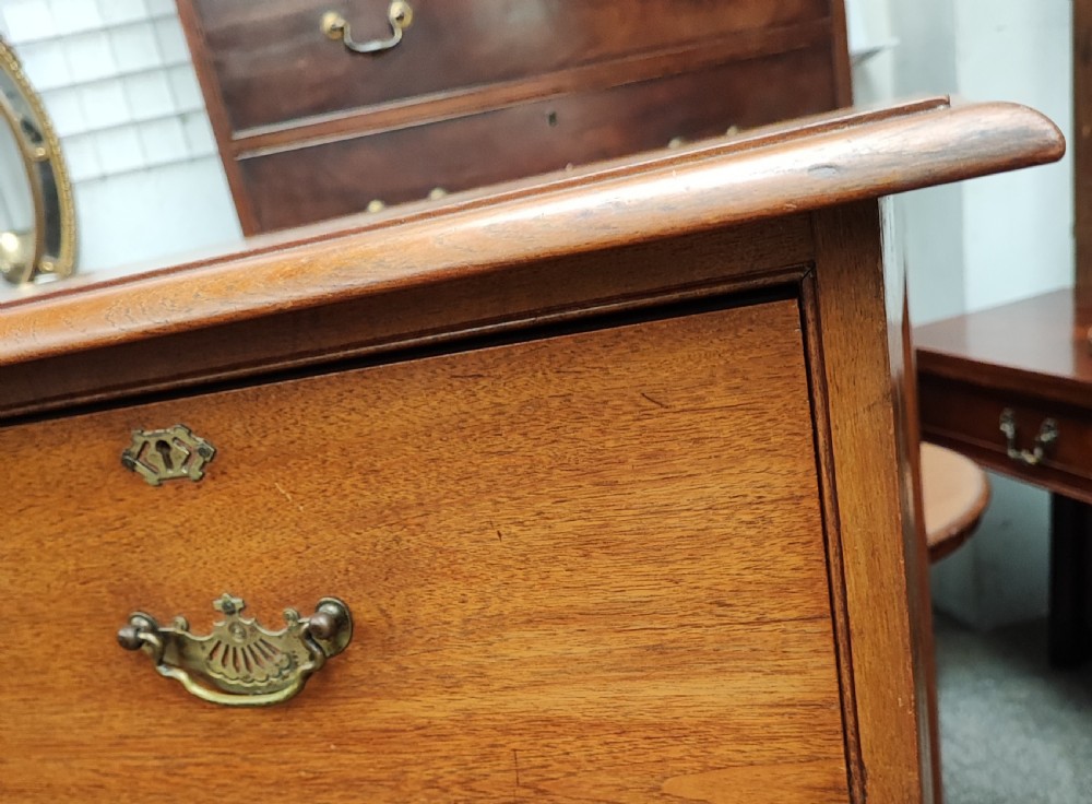 A Victorian solid  walnut chest of drawers. View XI