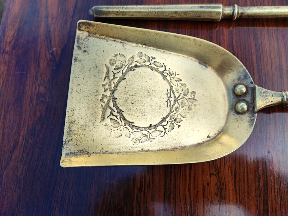 A pretty Georgian set of 3 brass fire irons. View VI