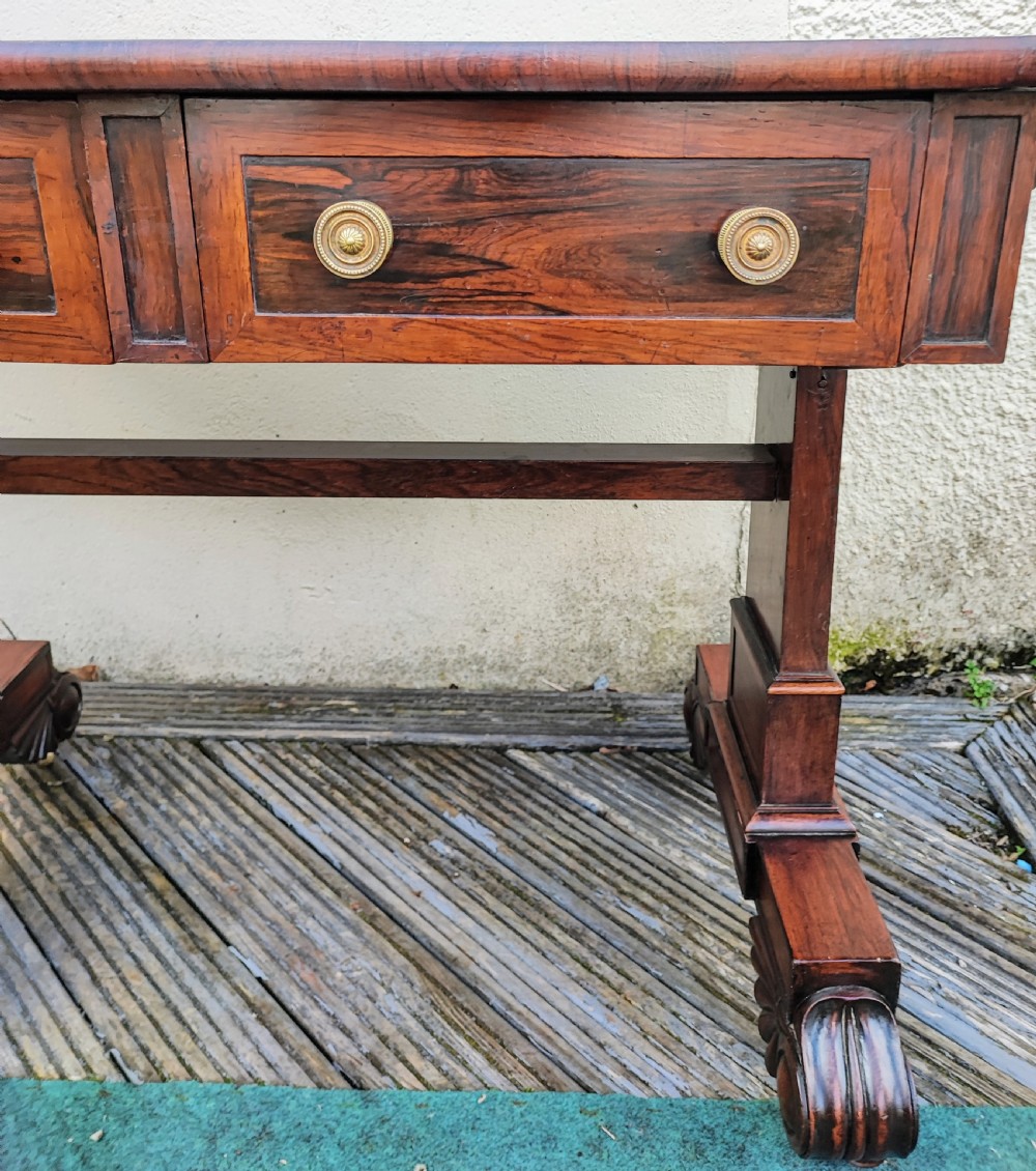A beautiful Regency rosewood sofa table. View V