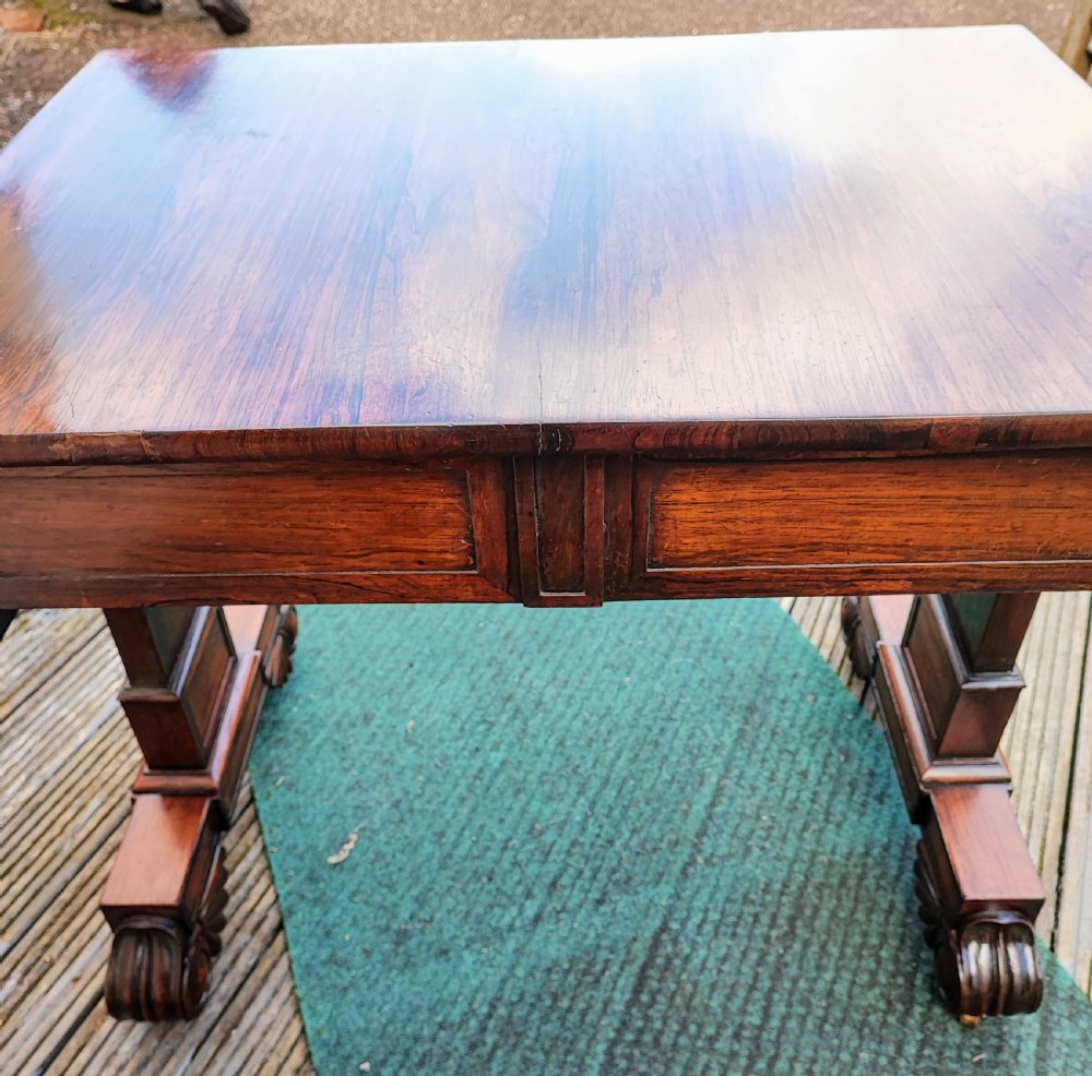 A beautiful Regency rosewood sofa table. View X