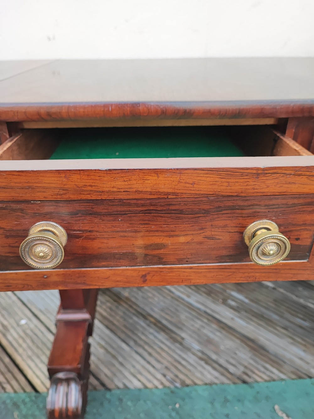 A beautiful Regency rosewood sofa table. View XI