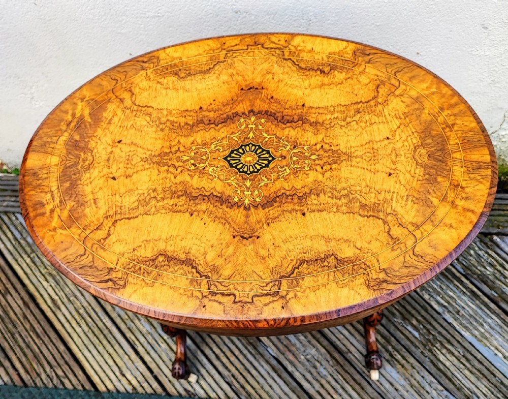 a stunning  victorian burr walnut work or sewing  table View XII
