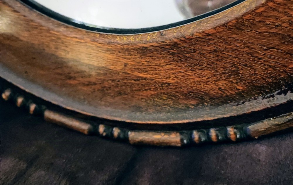 Edwardian oak oval mirror. View IV