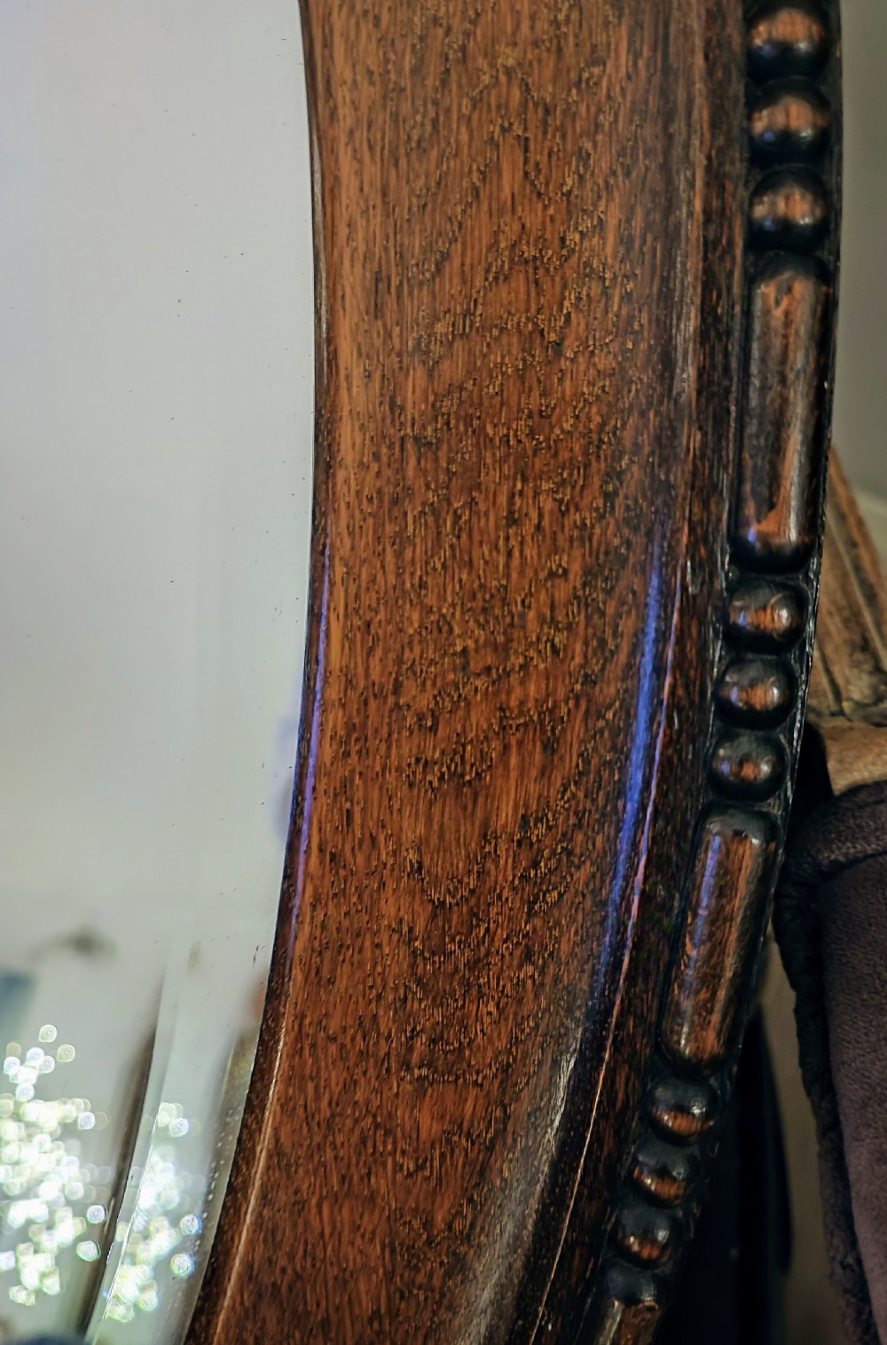 Edwardian oak oval mirror. View VII