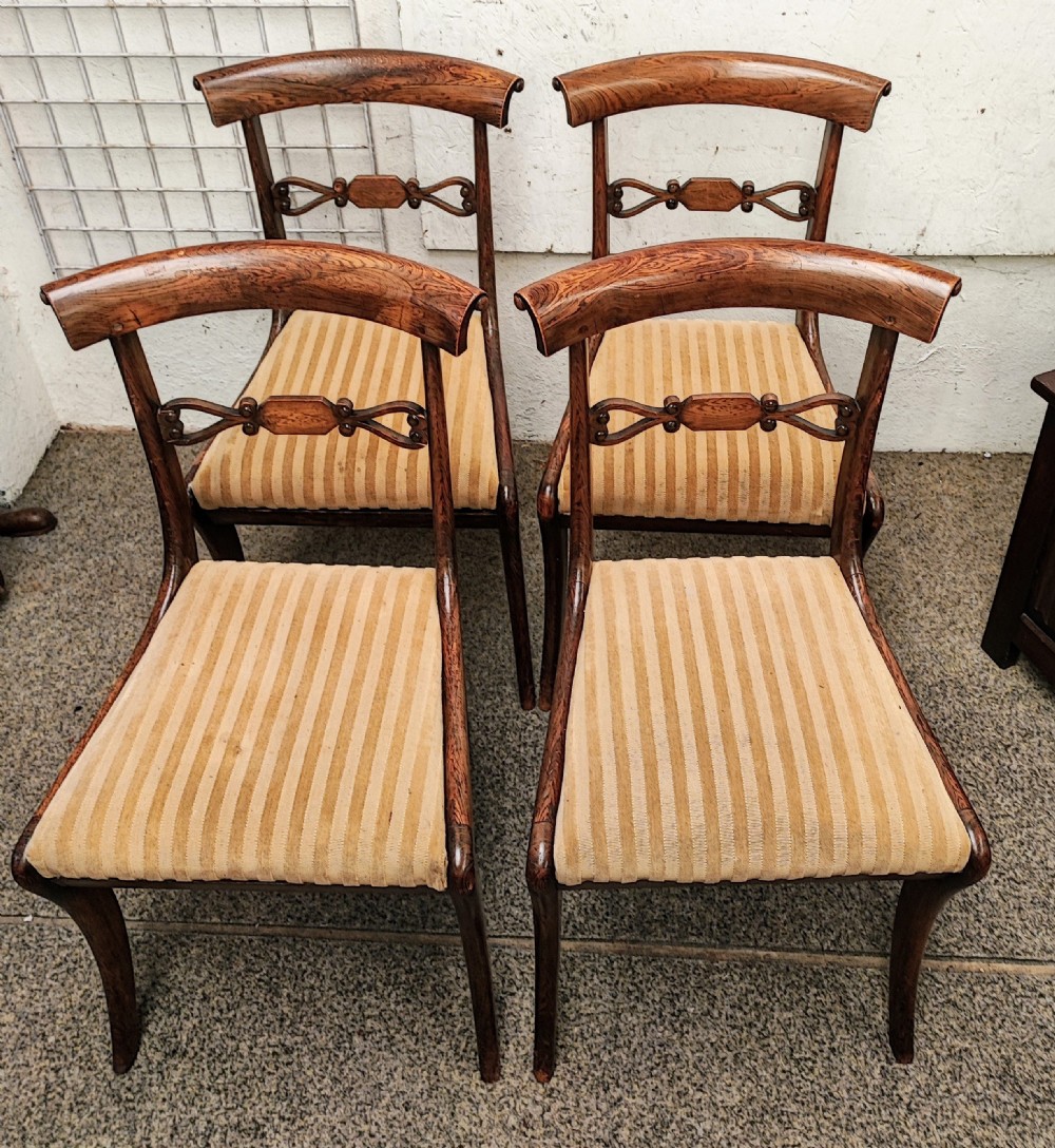 A pretty set of 4 Regency dining chairs.