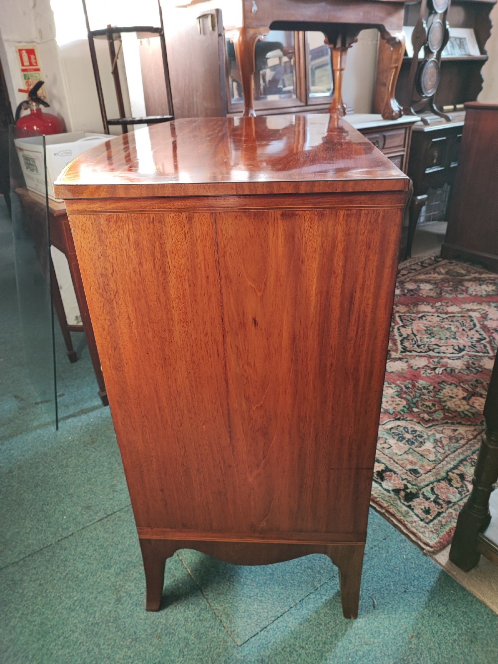 A good Georgian inlaid bow front chest of drawers. View III