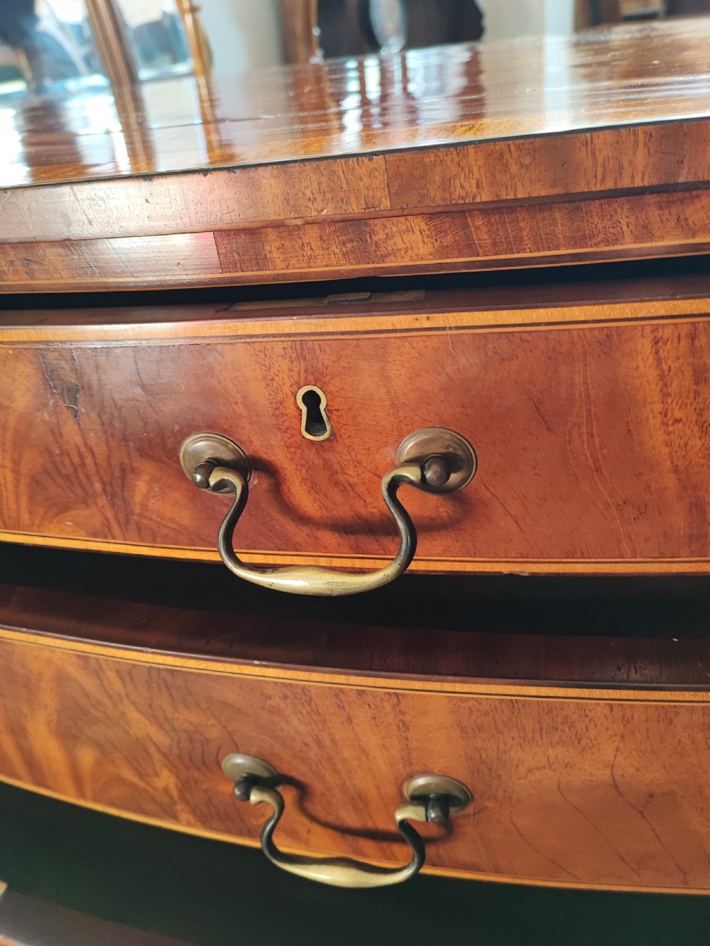 A good Georgian inlaid bow front chest of drawers. View VI