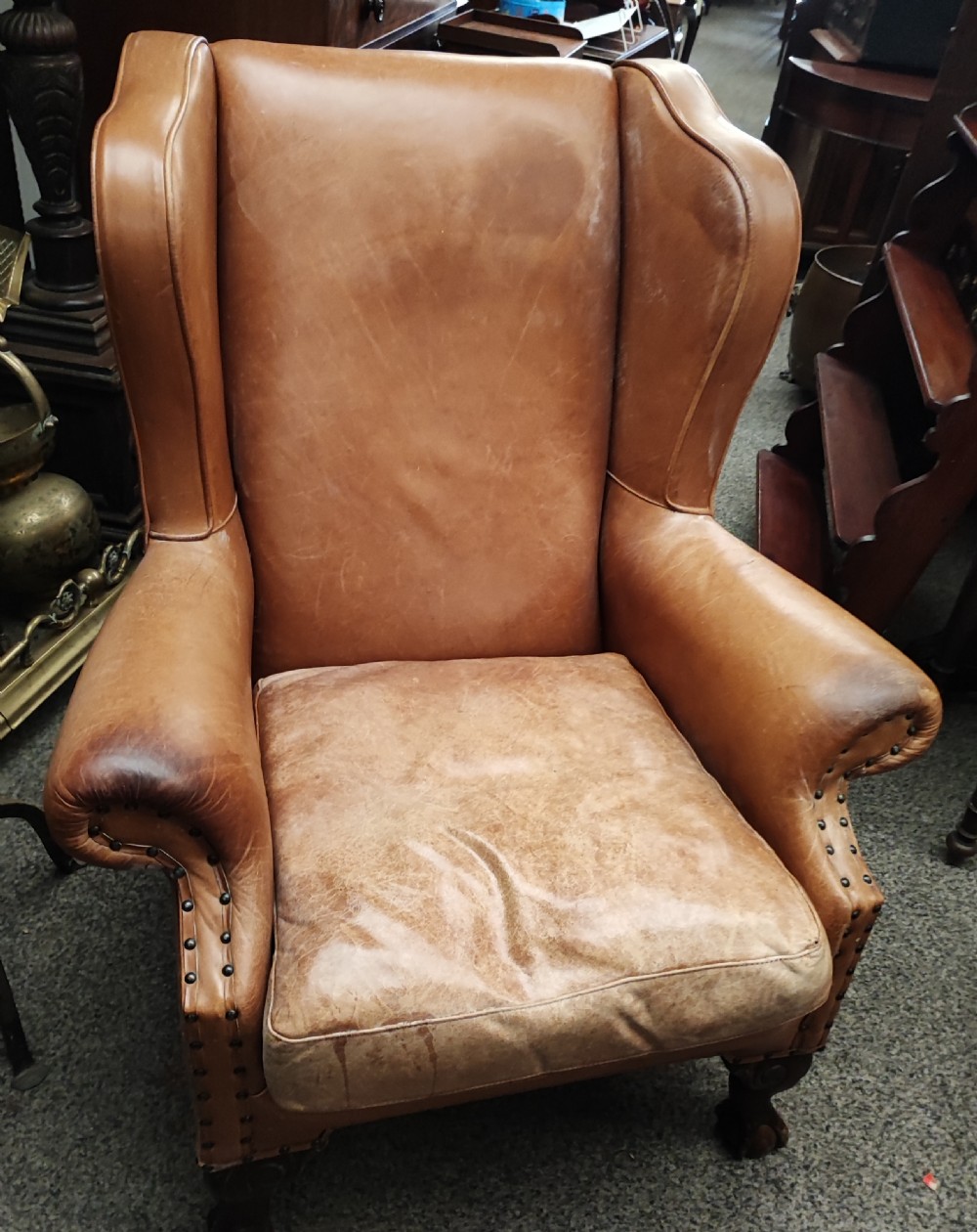 Leather and mahogany wing chair