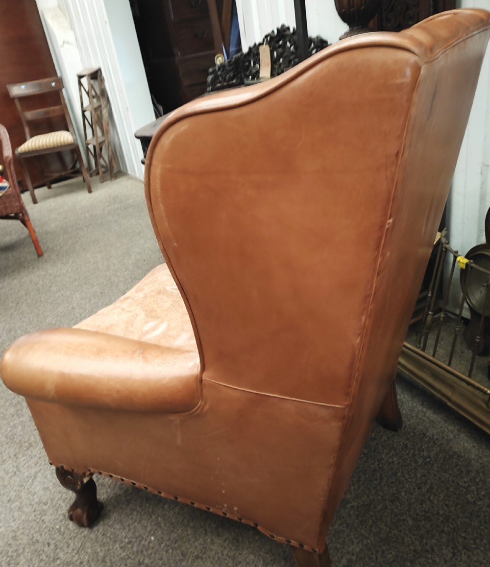 Leather and mahogany wing chair View VII