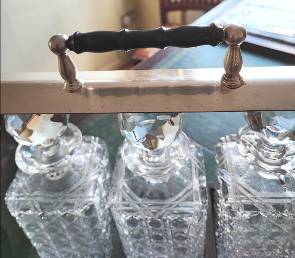 An antique mahogany and cut glass tantalus. View IV