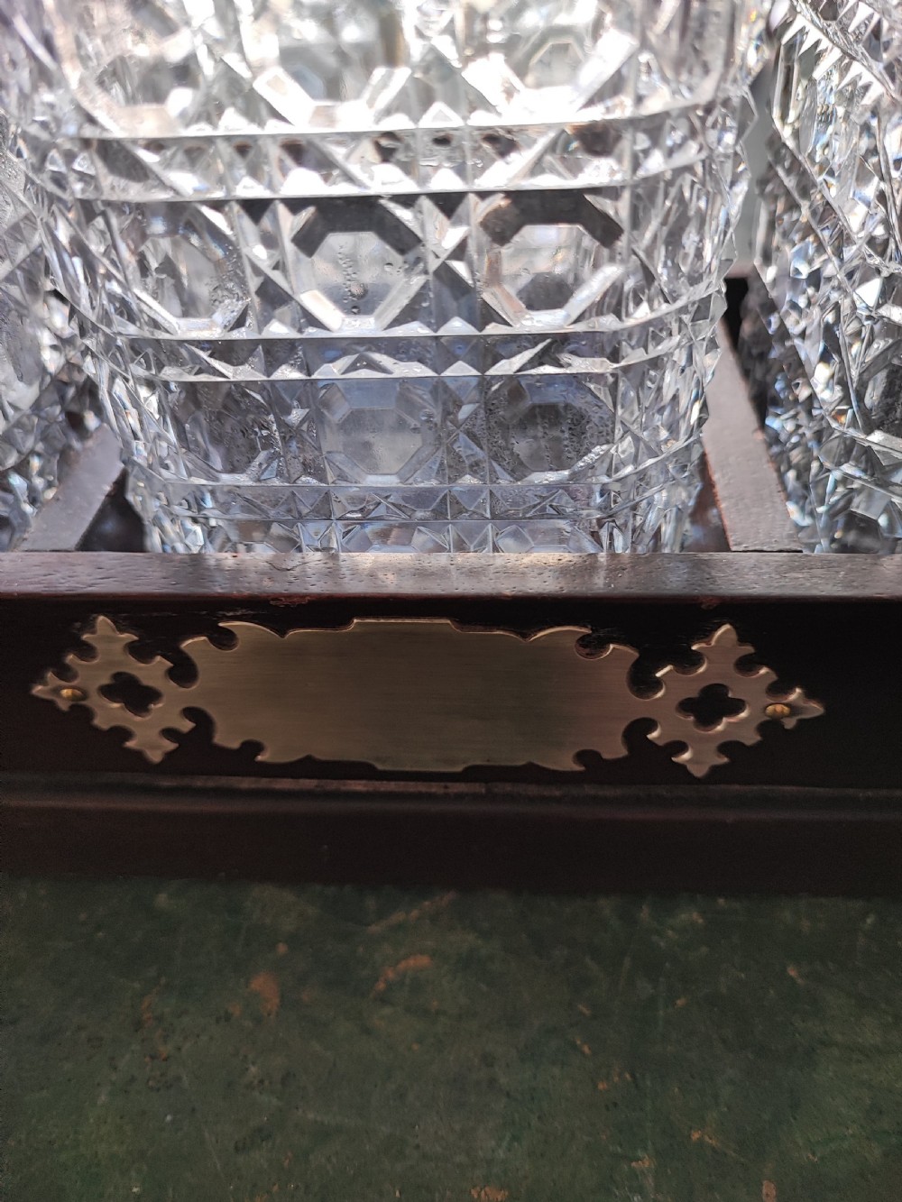 An antique mahogany and cut glass tantalus. View VIII