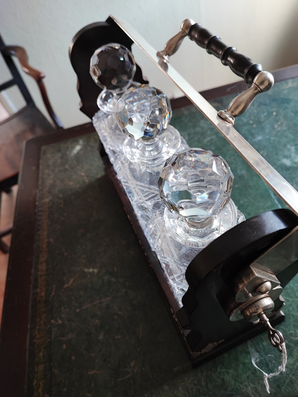 An antique mahogany and cut glass tantalus. View XI